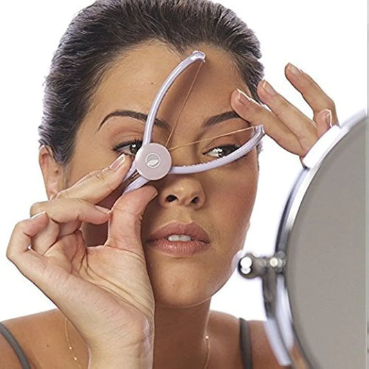 Silkne hair threading machine for facial hair removal, compact and easy-to-use design in white and pink, ideal for smooth and painless hair threading at home."